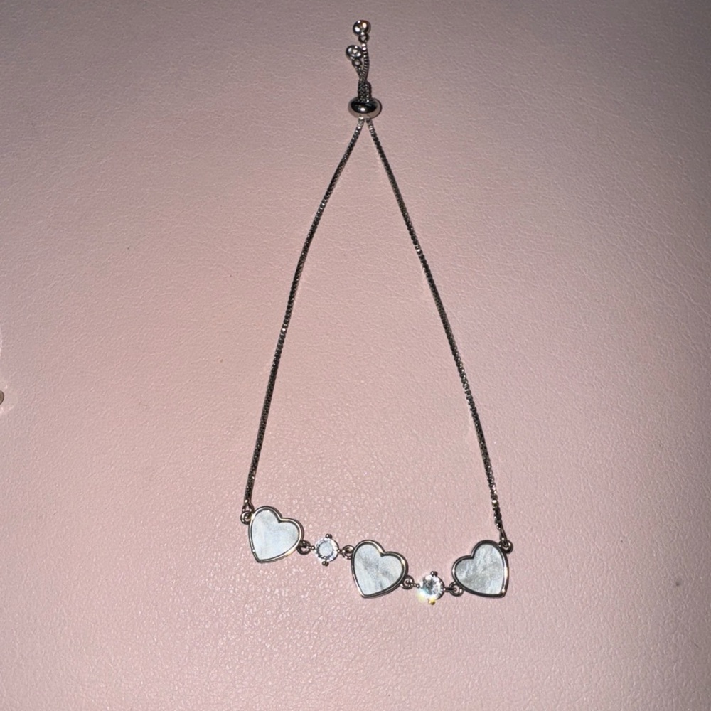 Silver bracelet with beautiful enamel hearts